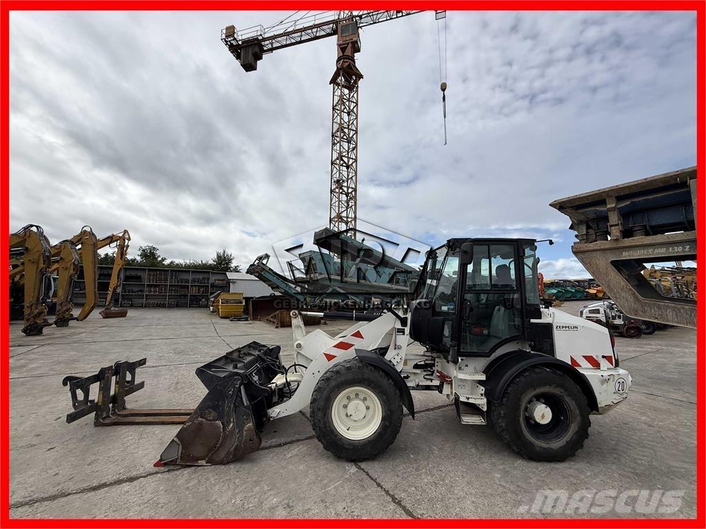 CAT 908M Carregadeiras de rodas