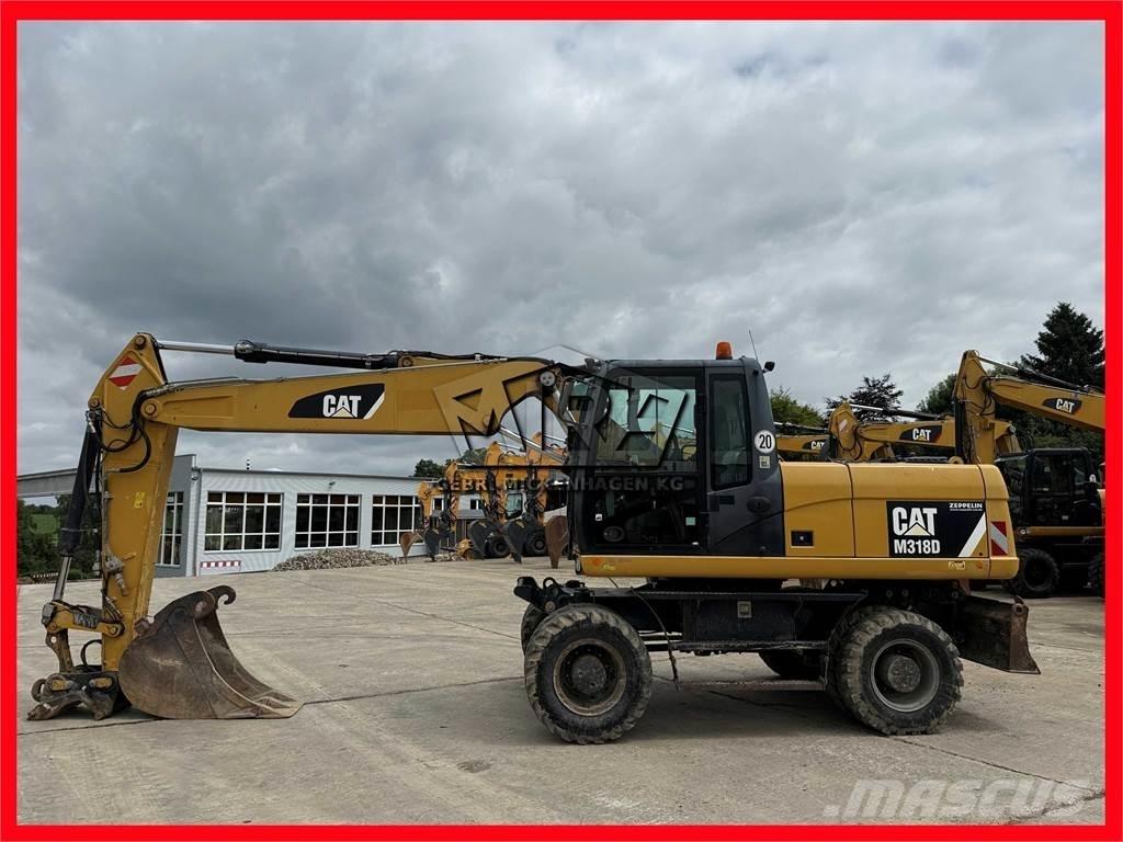 CAT M 318 D Escavadoras de rodas