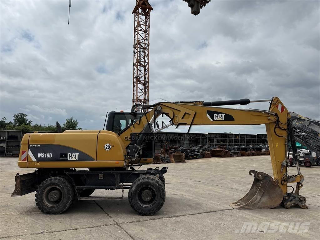 CAT M 318 D Escavadoras de rodas